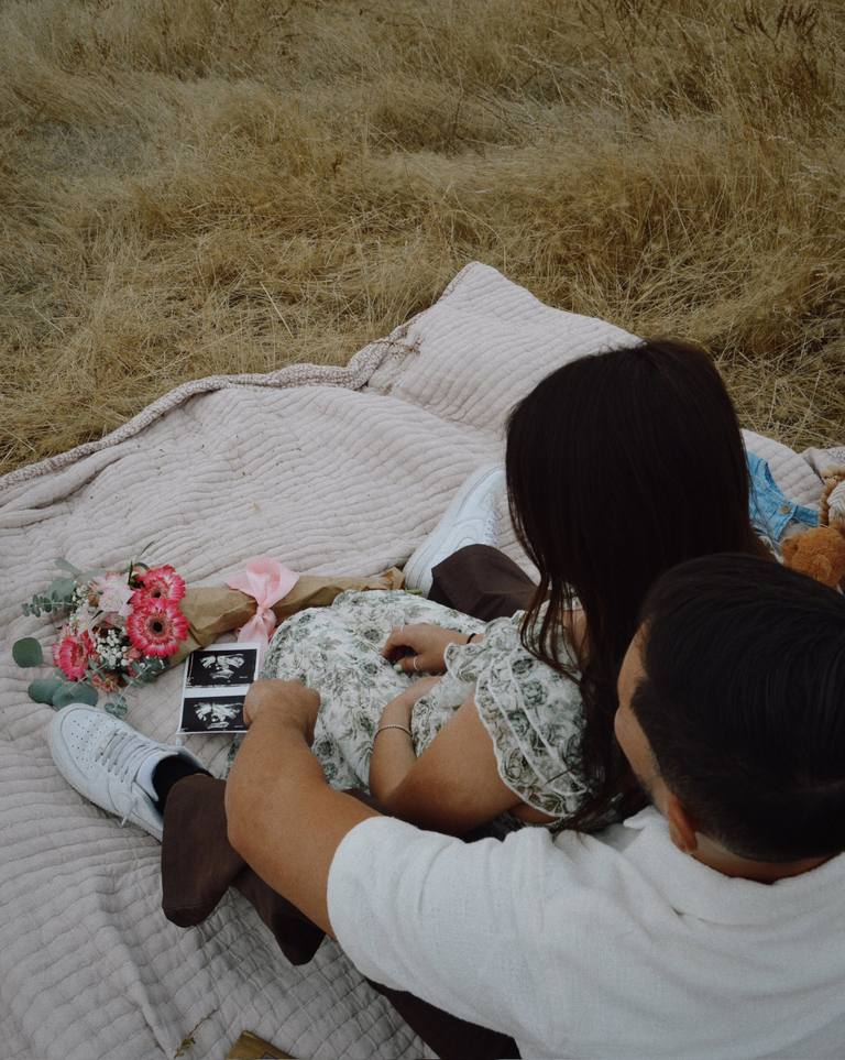 Editorial maternity portrait in warm natural light